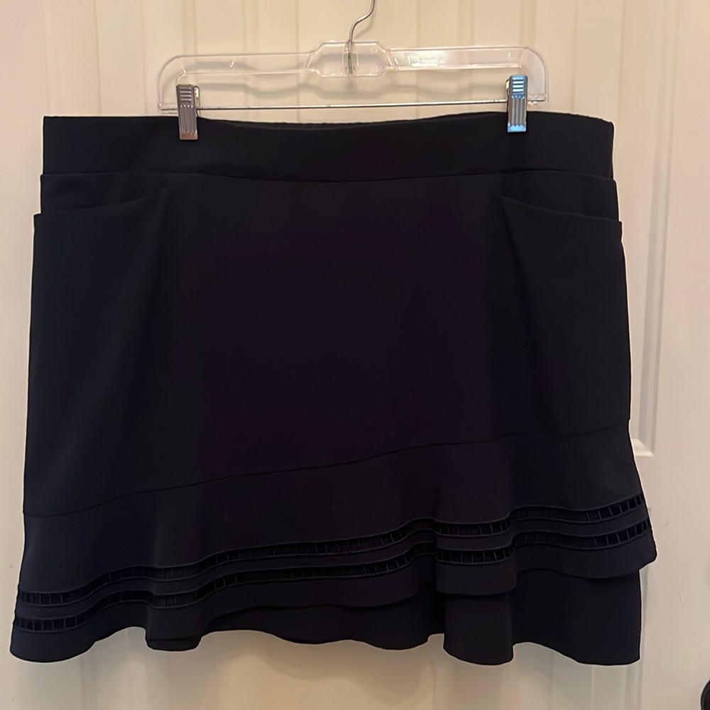 Navy Chicos ruffled skort, elastic waist, front pockets.  Like new!